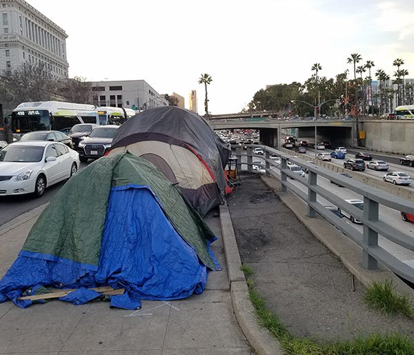 Judge urges settlement talks in homeless lawsuit