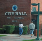 Bell terminates city manager facing corruption charge