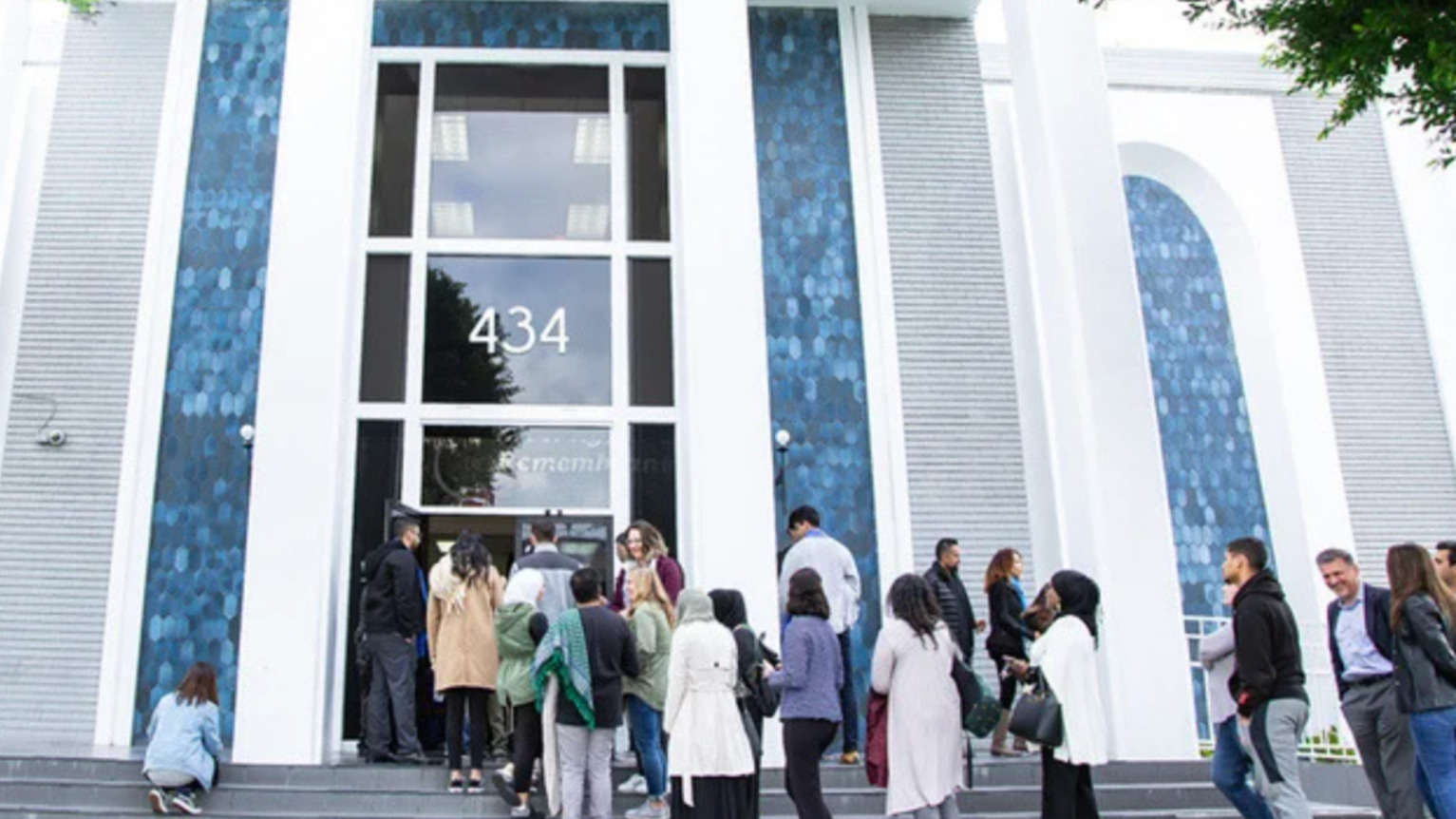 A photo of people entering the Islamic Center of Southern California
