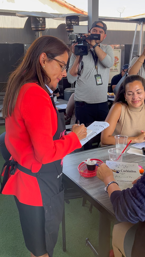 Congresswoman waits tables in support of living wage laws