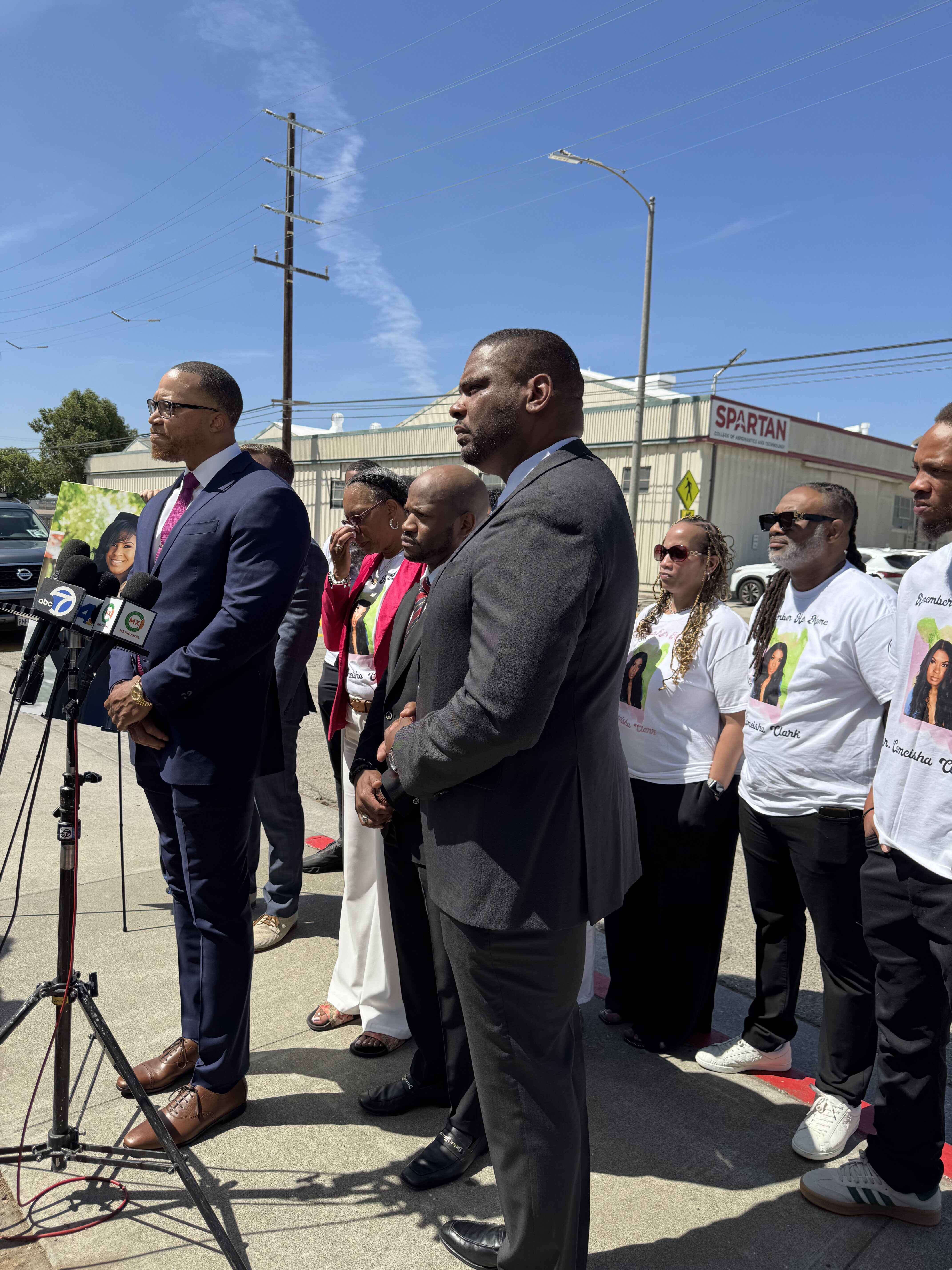 Family attorney Chris Stewart speaks at a news conference Aug. 20 announcing a wrongful death suit involving the death of Cameisha Clark, an administrator at Spartan College of Aeronautics and Technology.