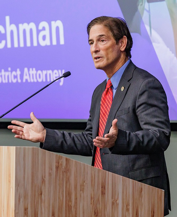 Los Angeles County District Attorney Nathan Hochman speaks to an audience.