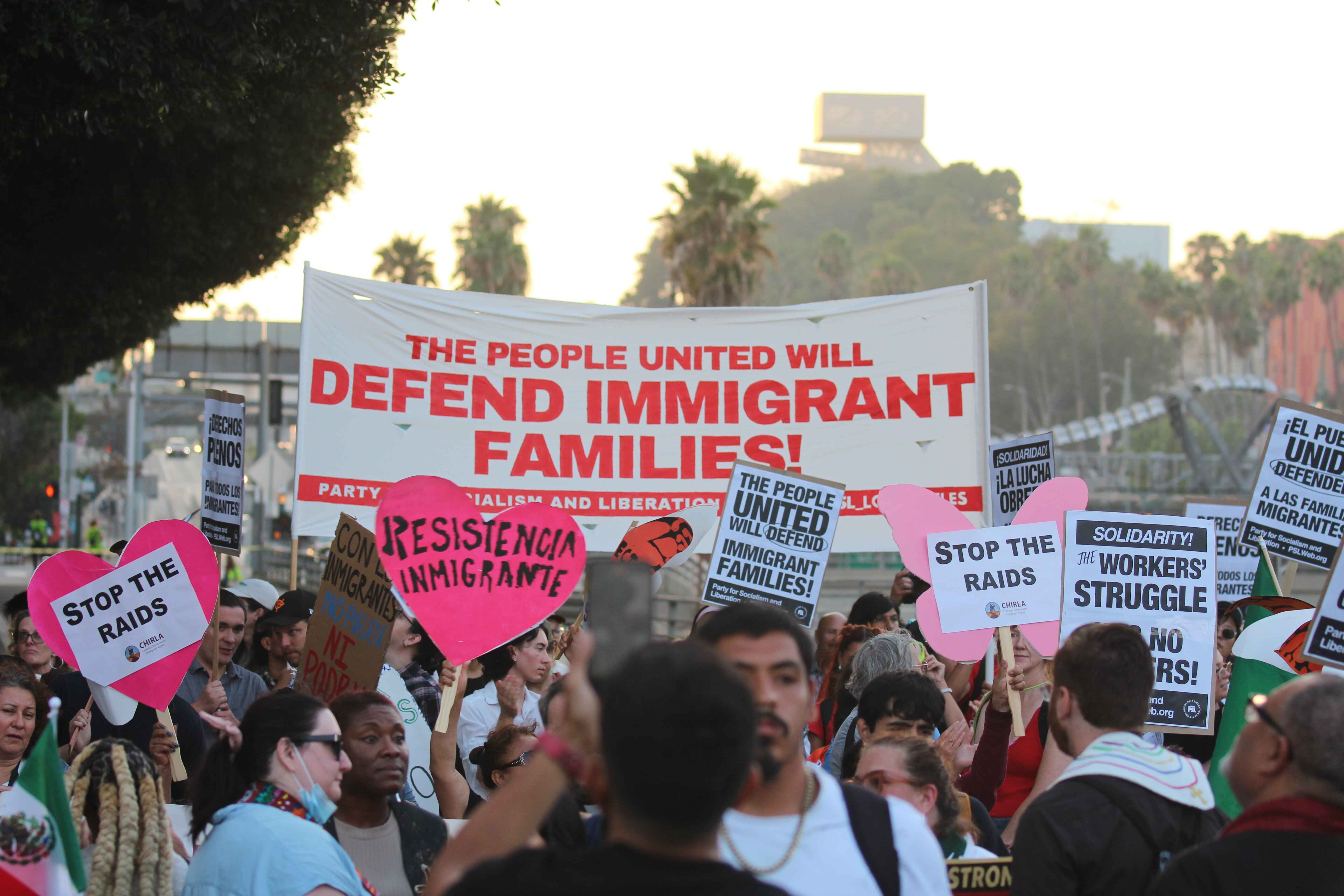 Protesters march in downtown Los Angeles Aug. 12 after immigrants rights advocates staged a ‘community stoppage’ in protest over federal immigration raids.